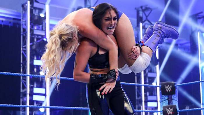 WWE's Sonya Deville puts Lacey Evans in the fireman's carry on SmackDown